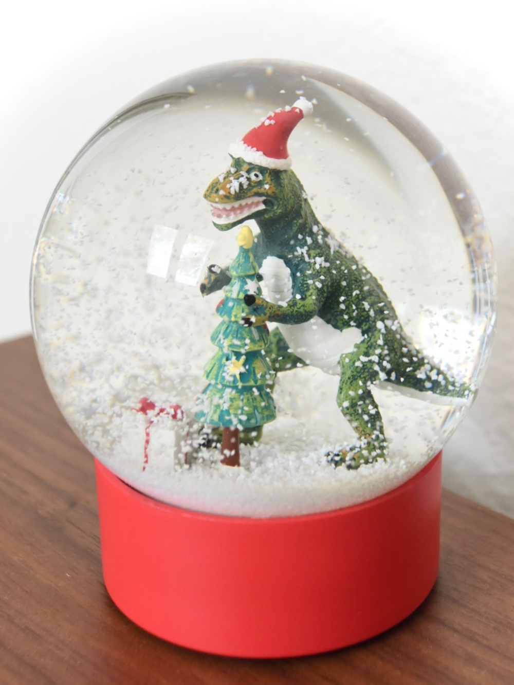Merri Glow T-Rex Dinosaur Santa Holiday Snow Globe
